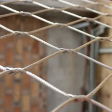 Сетка нержавеющая тросовая с параллельным узловым креплением и ромбической ячейкой Н1 7х7 AISI 304 40х69х2 мм